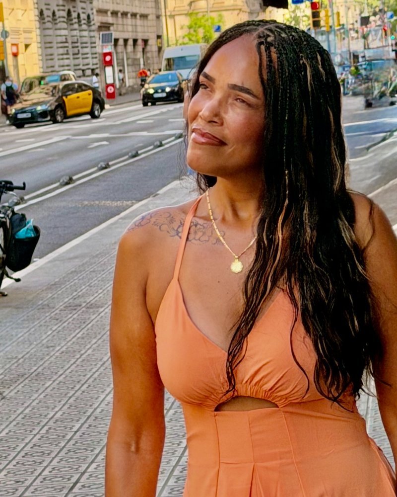Natasha, founder of LUX Travel Consulting, on a street in Barcelona